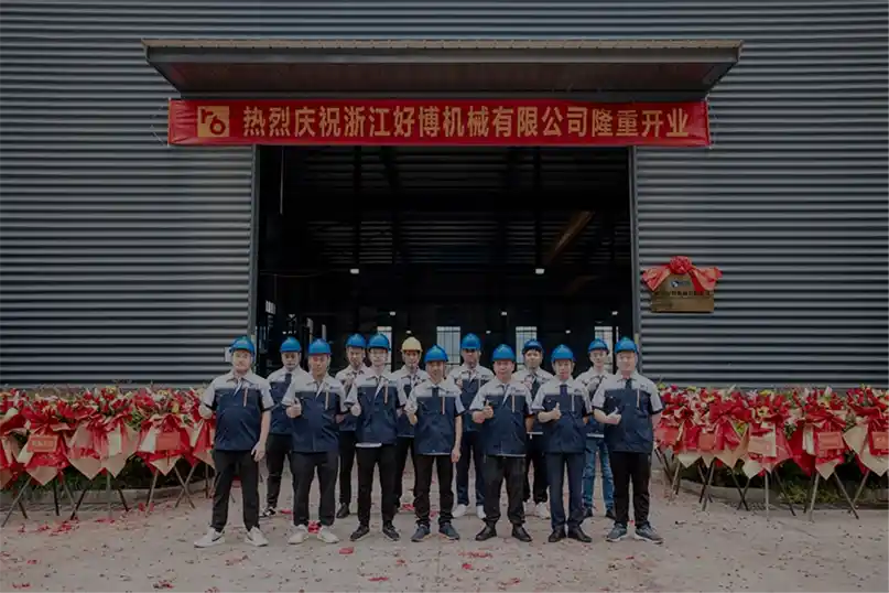 HOPE Machinery team at factory entrance